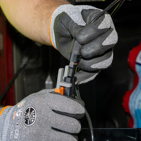 Close-up of steel inserts resisting warping in the Klein Tools 68426S wrench.