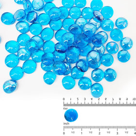 Kleuete Pacific Blue fire glass drops half-inch close-up show reflective facets for glow.