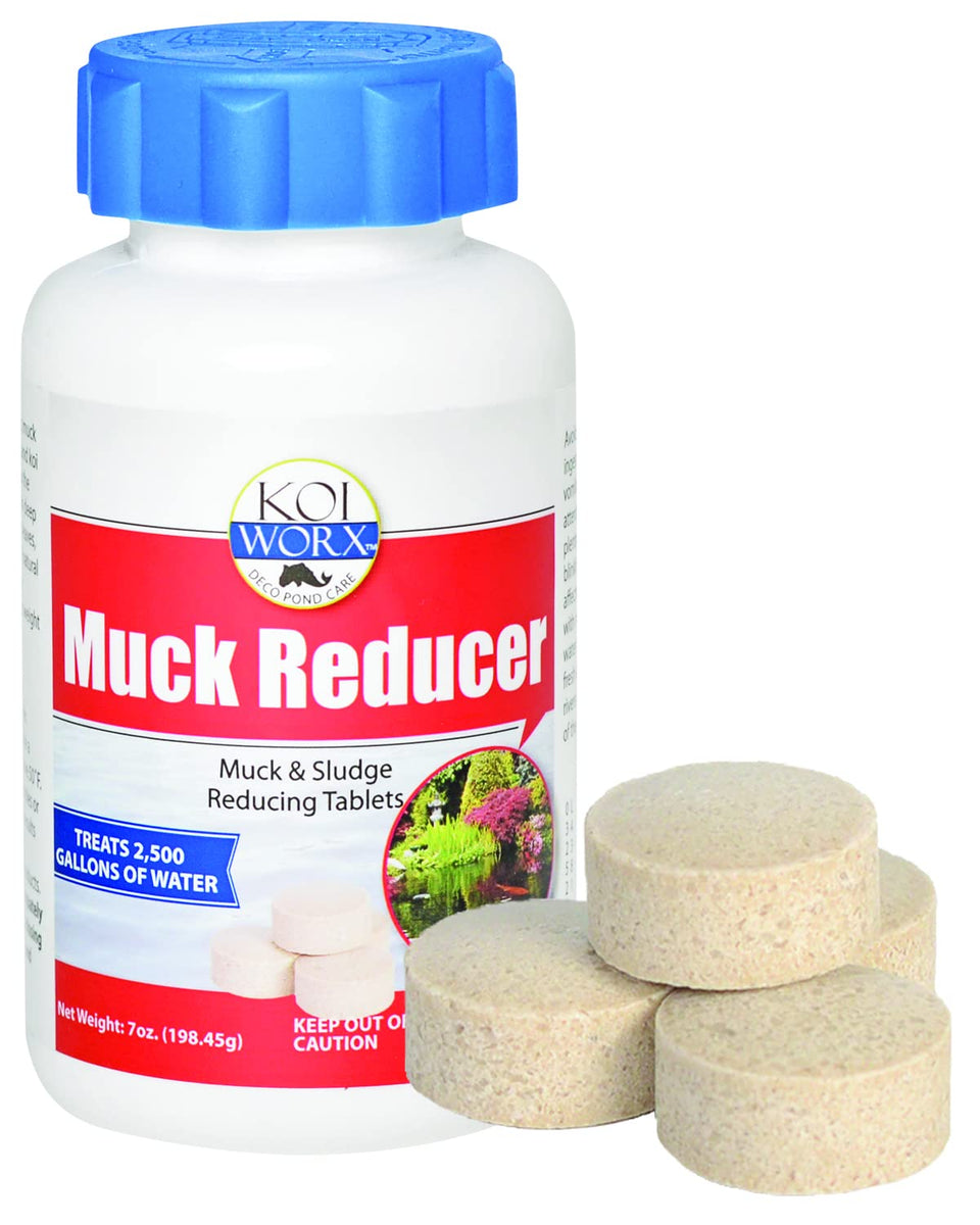 Koi Worx Muck Reducer tablet dissolving in pond water to reduce muck