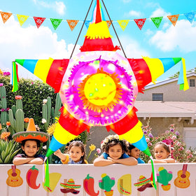 Vibrant star pinata design illuminates yard during festive celebrations.