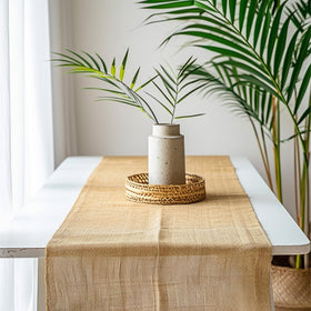 Koretech burlap roll wrapped around tree trunks for warmth and frost protection.