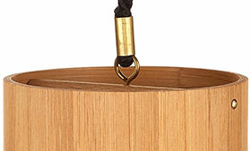 Koshi Ignis bronze baton with glass pendant emphasizes bright overtones.