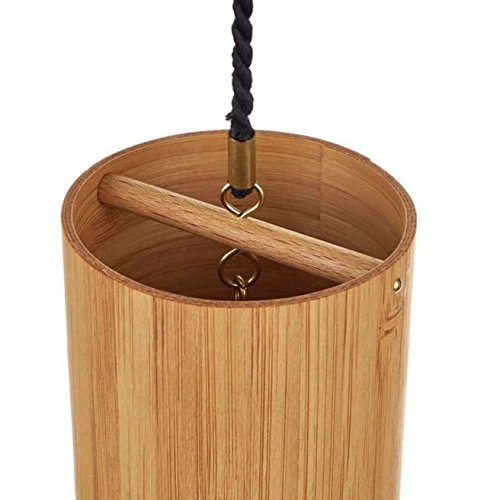 Koshi Ignis chime in a living space creates gentle wind music.