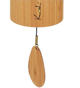 Koshi Ignis glass pendant reflecting soft light during calm evenings.
