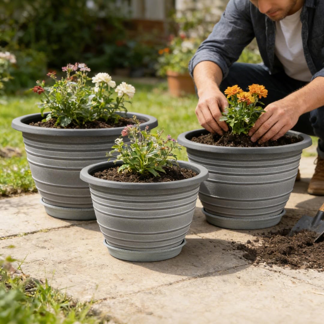 KPUVX 12-inch planter in outdoor garden setting complements patio decor.