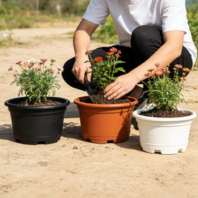 KPUVX planter pot with drainage holes designed for easy cleaning.