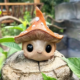 Kudriod mushroom garden statue, front view, adds whimsical charm to your yard.