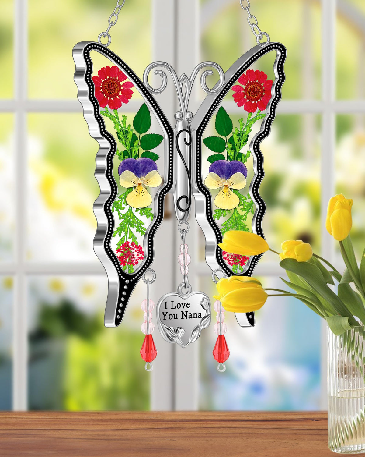 KYBOSAM Nana butterfly suncatcher close-up with engraved tag.