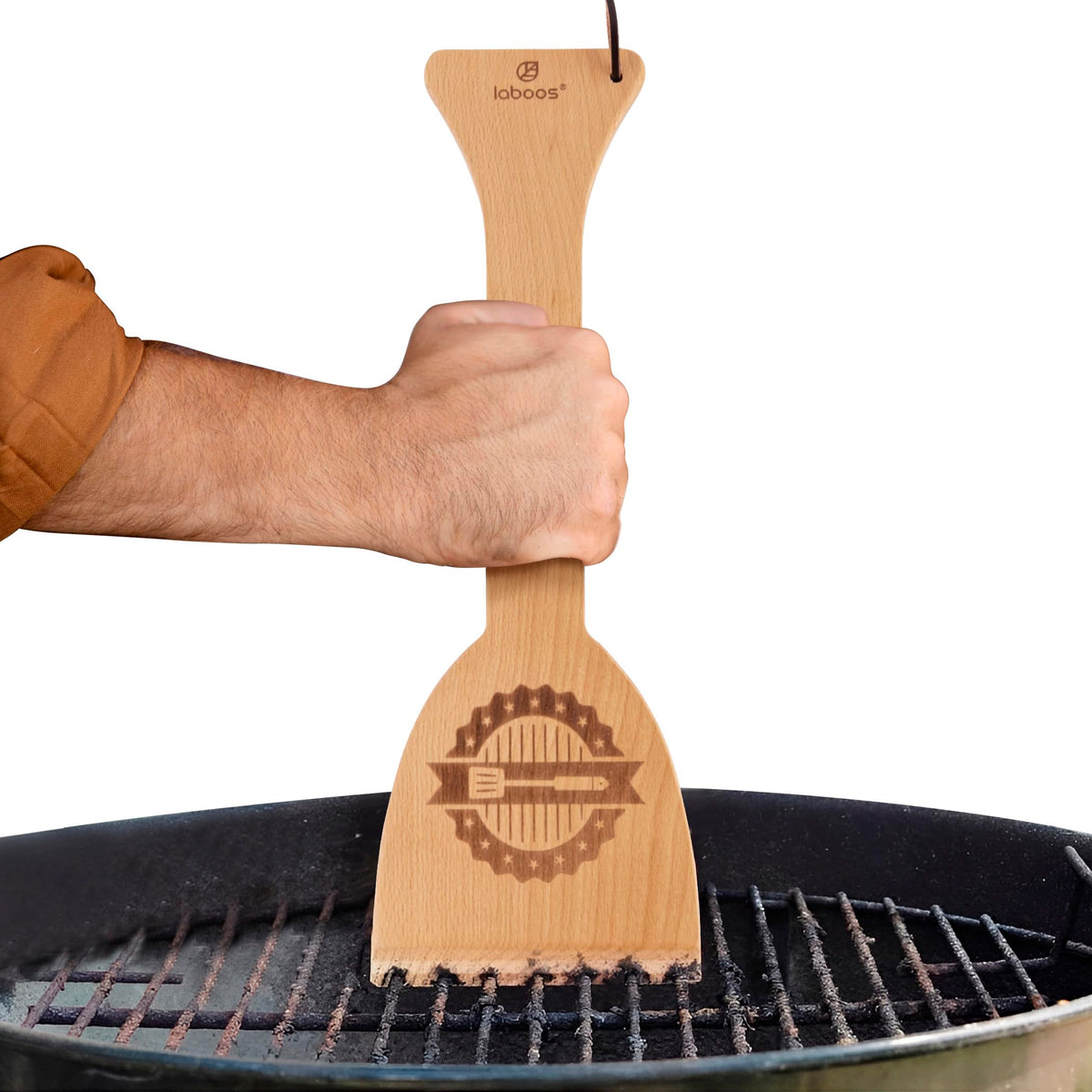 Laboos wooden BBQ scraper close-up with grooved edge for bristle-free cleaning.