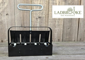 Ladbrooke Mini 4 with seed dimple preformed in each block for easy sowing.