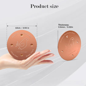 Laddatz copper bird bath disc under sun, stabilizing water with four-point support.