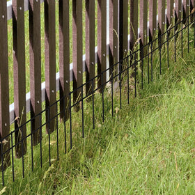 LADECH no-dig barrier in action around garden, reducing animal intrusion and damage.