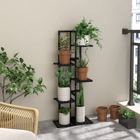 Laiensia 5-tier bamboo stand in indoor corner for space-efficient display.