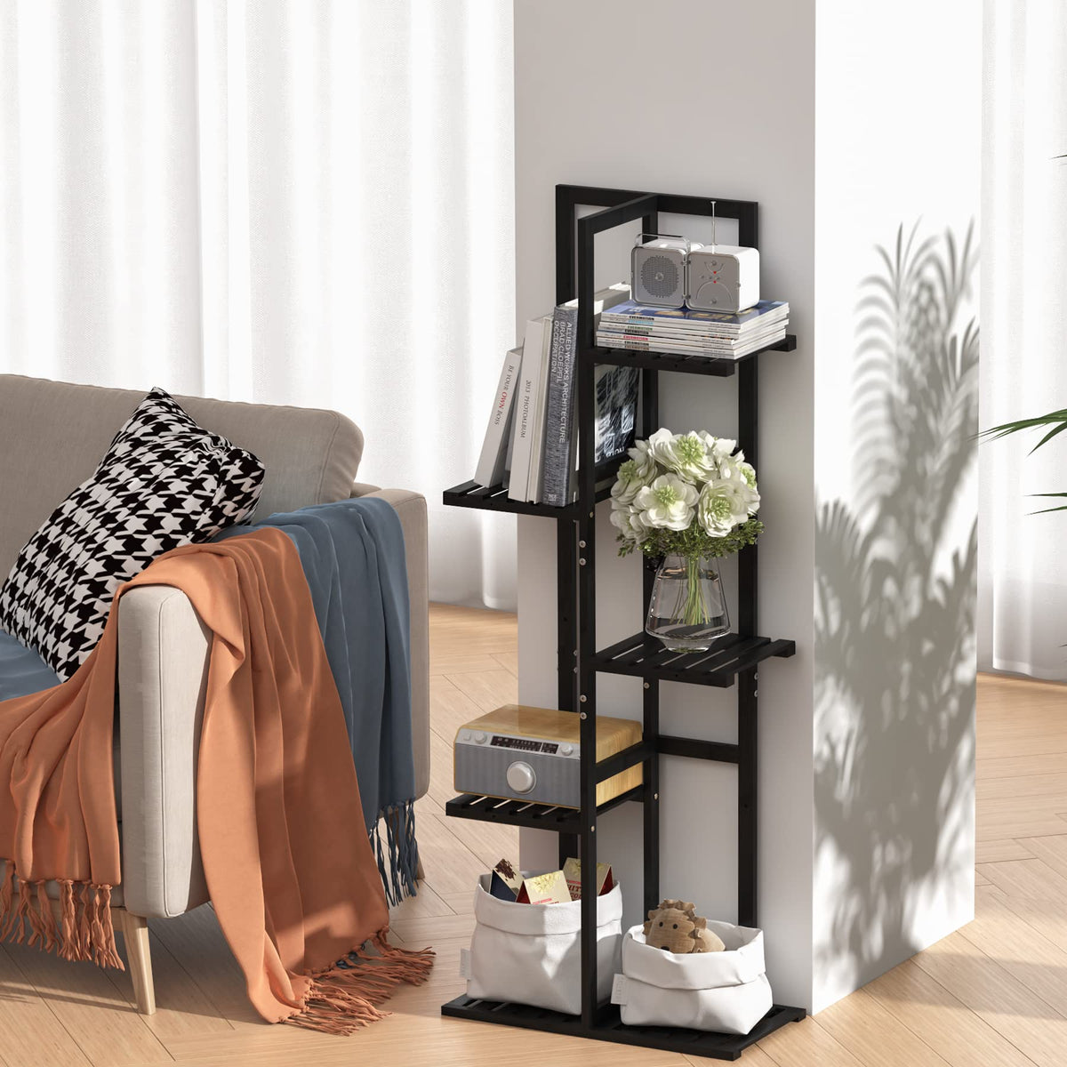 Laiensia 5-tier bamboo stand on outdoor patio ideal for garden organization.