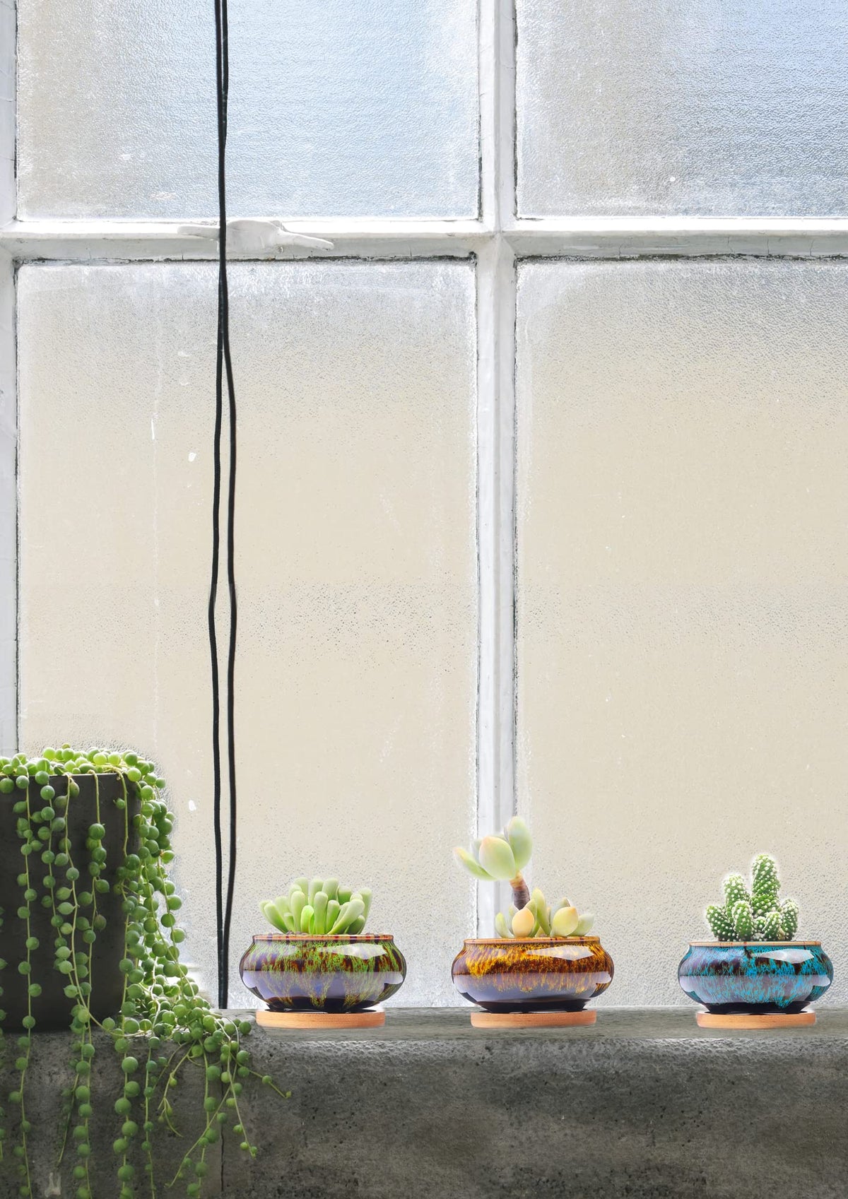 LamDawn terracotta pot with crackle glaze adds color to balcony decor