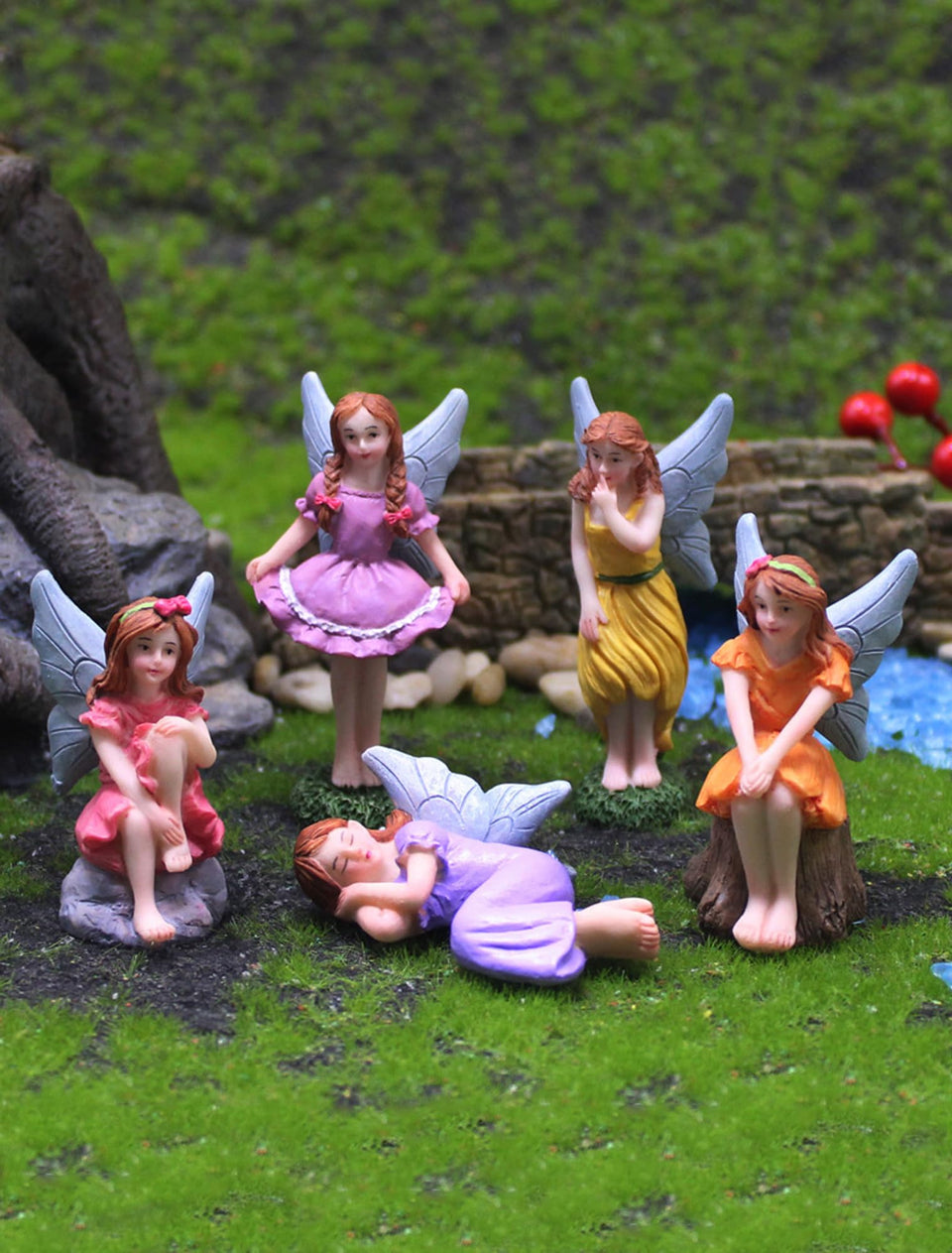 Lamnes Miniature Fairy Garden Figurines in assorted poses add whimsy to outdoor spaces.