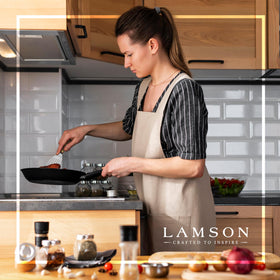 Lamson spatula in action flipping fish for even browning.