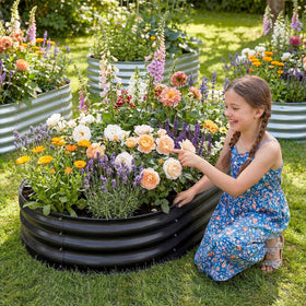 Backyard garden with Land Guard galvanized raised bed in use