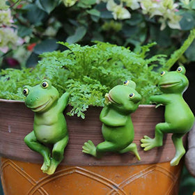 LANDOR three frogs hanging figurines add whimsy to pots and fences.