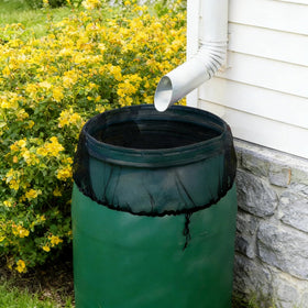 Laoha mesh cover protecting a planter, keeping dust and pests away.