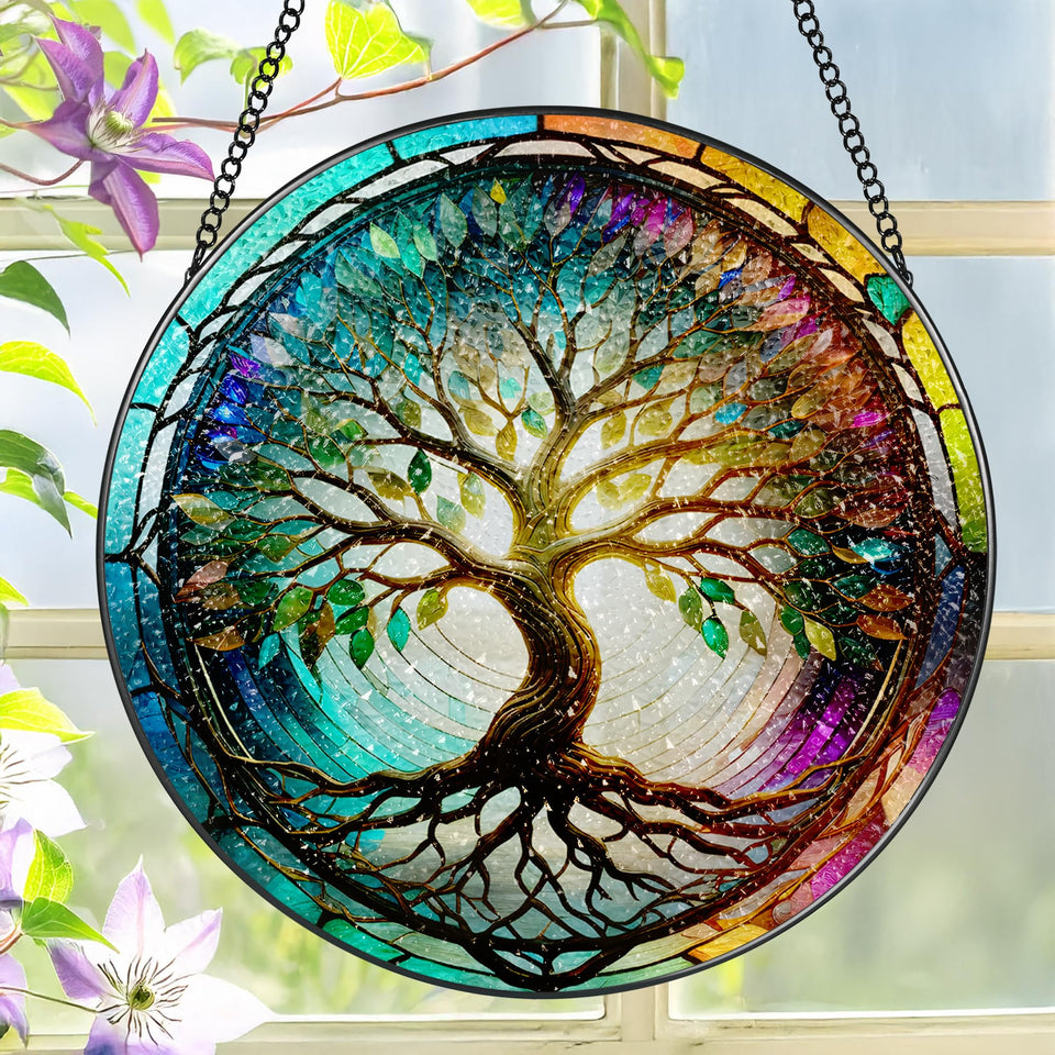 LAOWEIKI 8-inch Tree of Life suncatcher close-up showing vibrant glass colors catching sunlight in a sunny window.