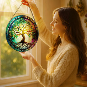 LAOWEIKI stained glass panel with a wavy edge radiates bold hues in bright light.
