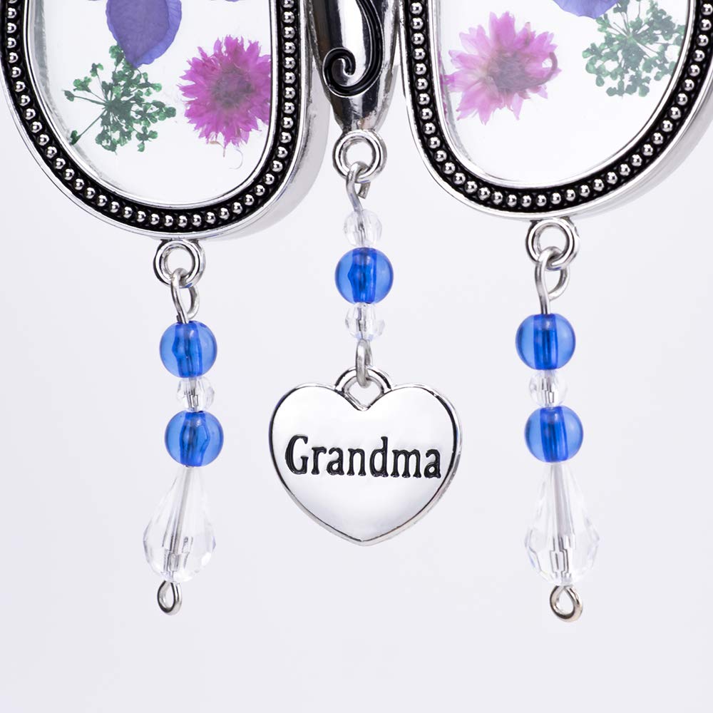 Laraine butterfly suncatcher with crystal accents catches light beautifully.