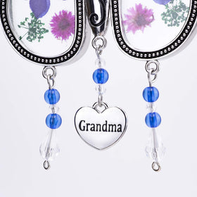 Laraine butterfly suncatcher with crystal accents catches light beautifully.
