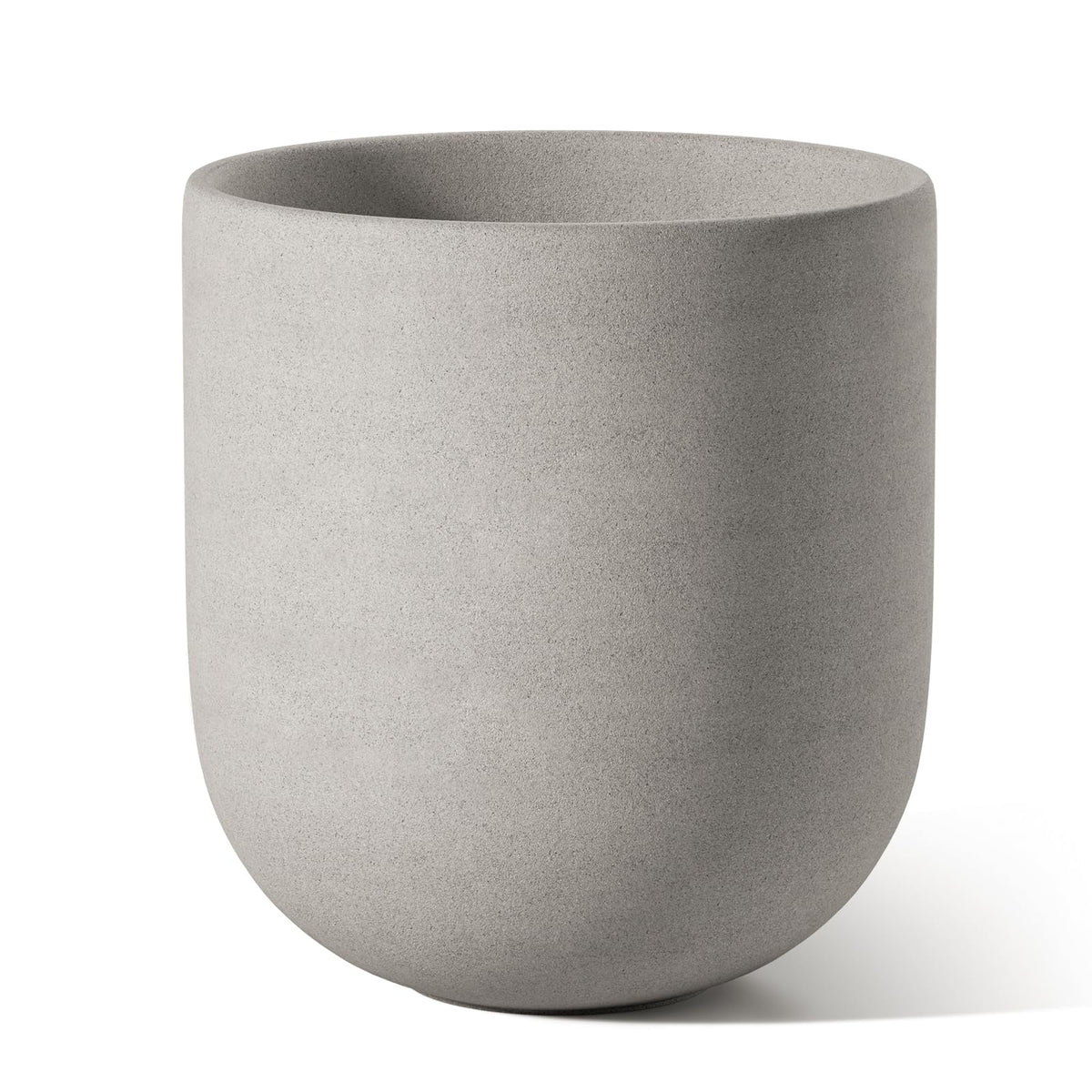 LE TAUCI cement-gray planter on a windowsill with natural light.