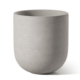 LE TAUCI cement-gray planter on a windowsill with natural light.
