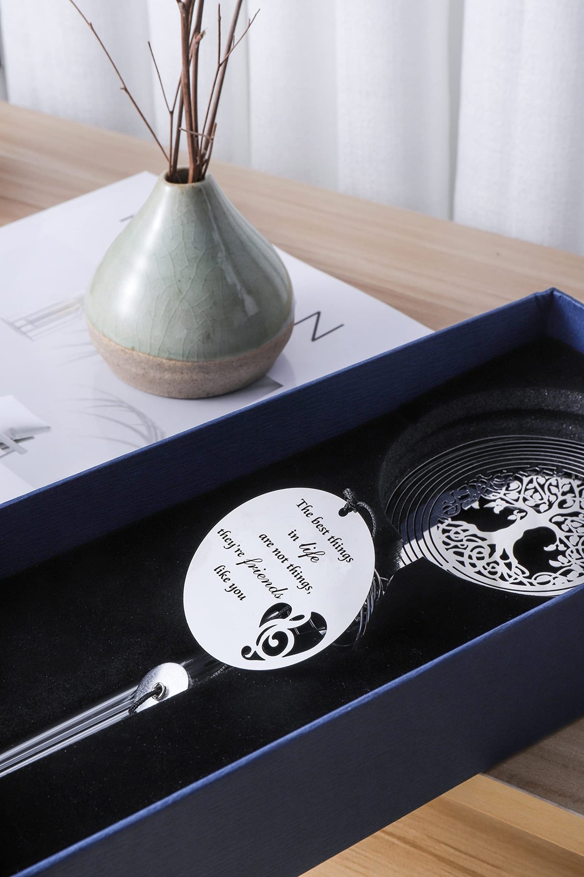 LEAVORES wind chime arrives in a gift-ready keepsake box