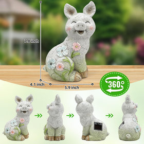 Leekung pig statue on balcony brightens patios after sundown.