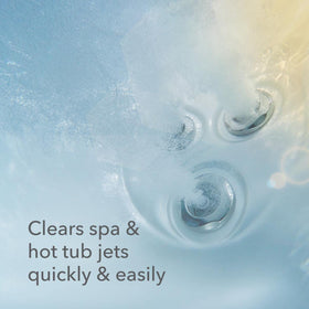 Leisure Time Jet Clean bottle being poured to clean spa plumbing