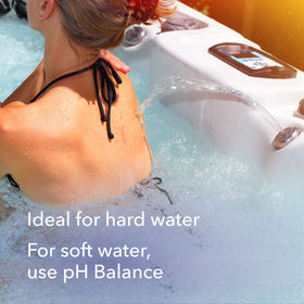 Leisure Time pH Balance Plus spa water being poured, hinting at steady pH.