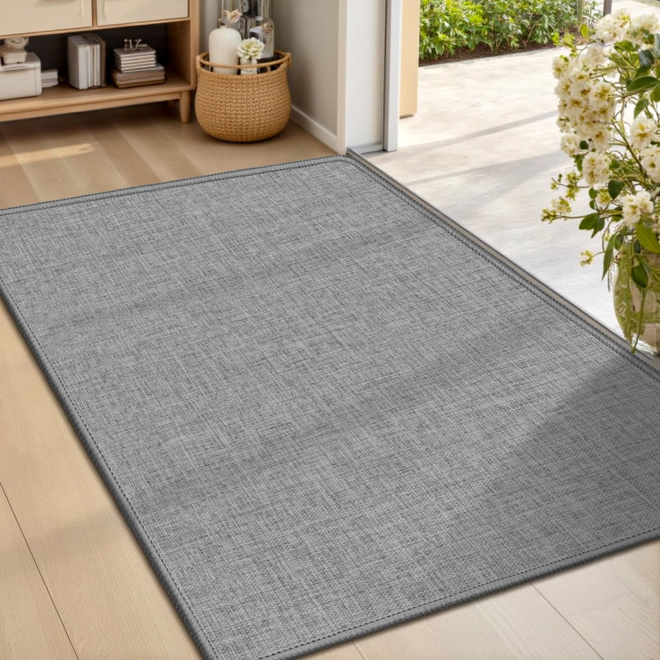 LEKEEPGO ultra-thin door mat 24x36 absorbs moisture and traps dirt at the entry.