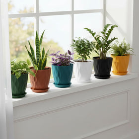 LESOASIS 8-inch teal pot with wave texture for modern spaces.