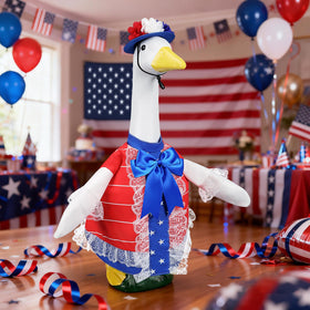 Lettry porch goose statue display with outfit creates eye-catching garden focal point.