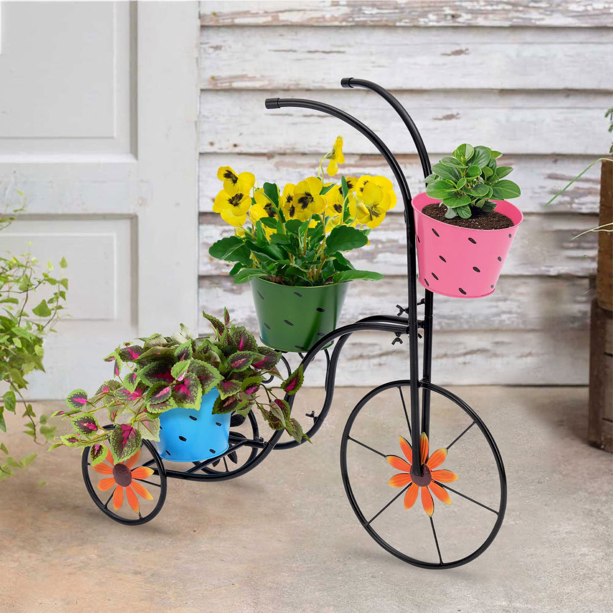 LEWIS&WAYNE three-tier planter on legs fits patios and verandas.