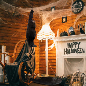 Lewtemi crow decor on a tree creates spooky Halloween ambience