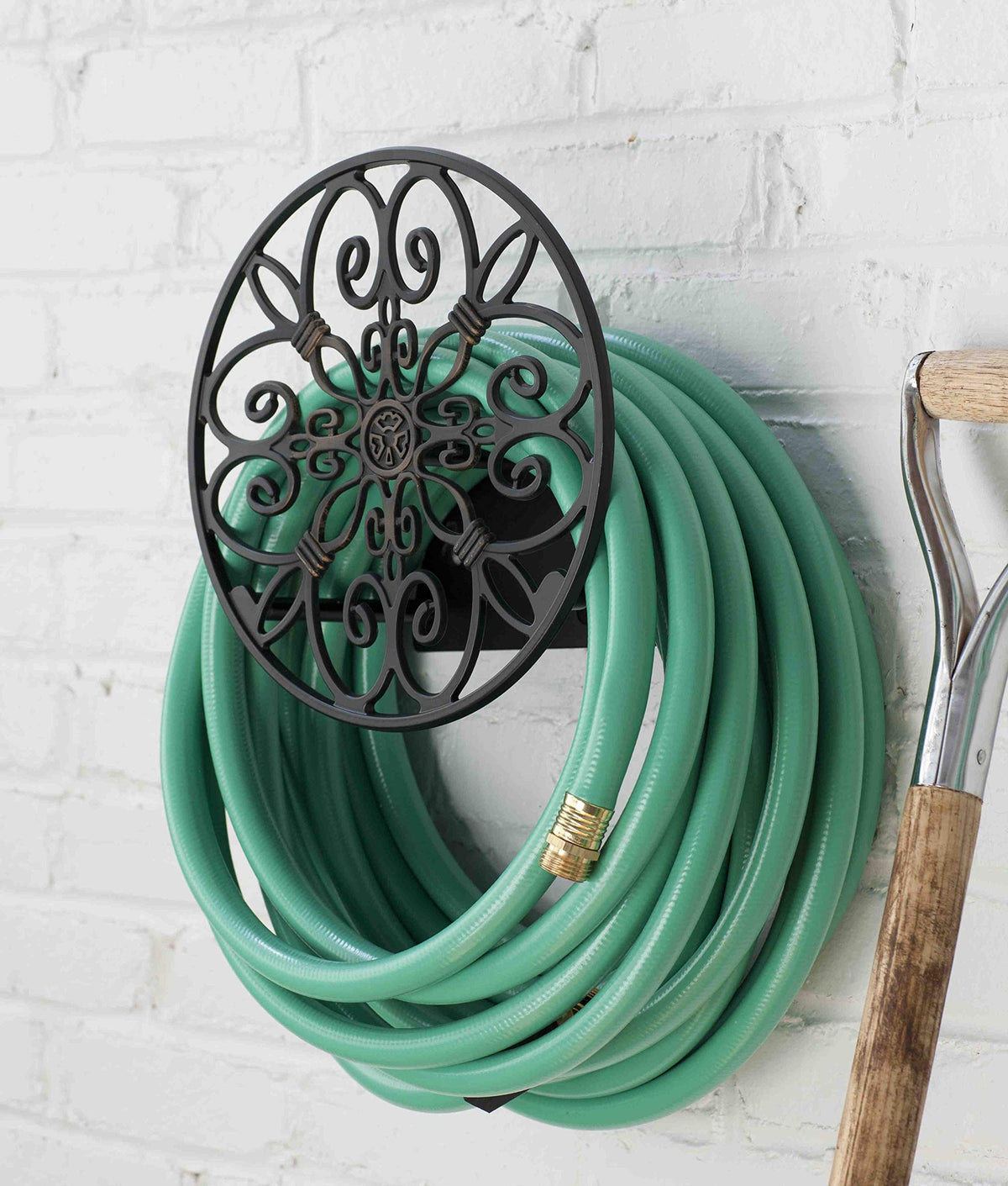 Liberty Garden hose butler bronze finish stores up to 125 feet of hose when not in use.
