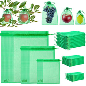 LifeisLuck fruit protection bags 8x12 on a tree guarding fruit from pests while sun shines.