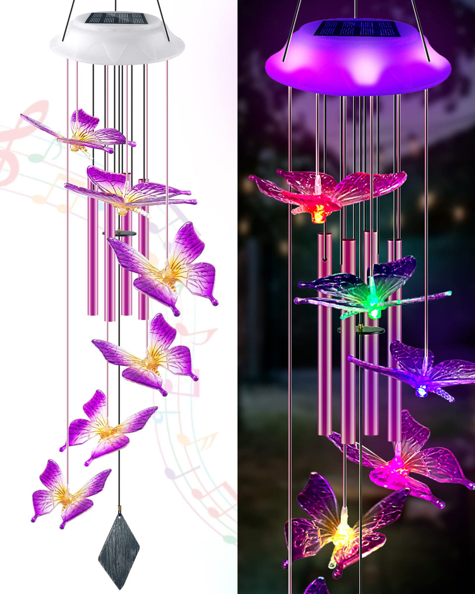 Lightalent solar butterfly wind chime glows purple in garden at night