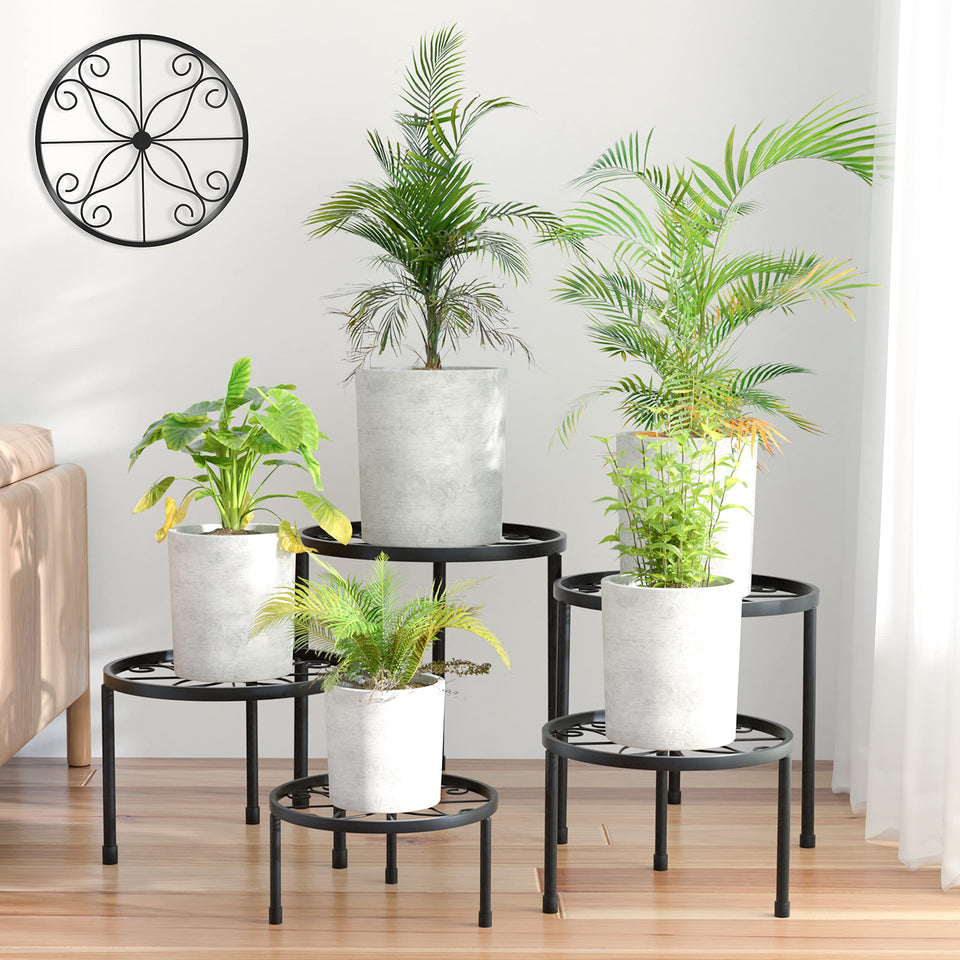 Linpla 5-pack metal plant stands with varied heights for versatile indoor decor.