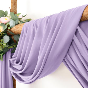 LINXTAR 18ft drape on arch creates flowing ceremony backdrop.