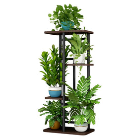 LINZINAR 4-tier plant stand displaying five pots in a compact indoor corner.