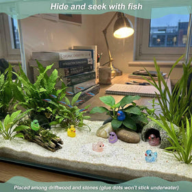 LionWell mini resin ducks with necklaces create playful shelf decor.