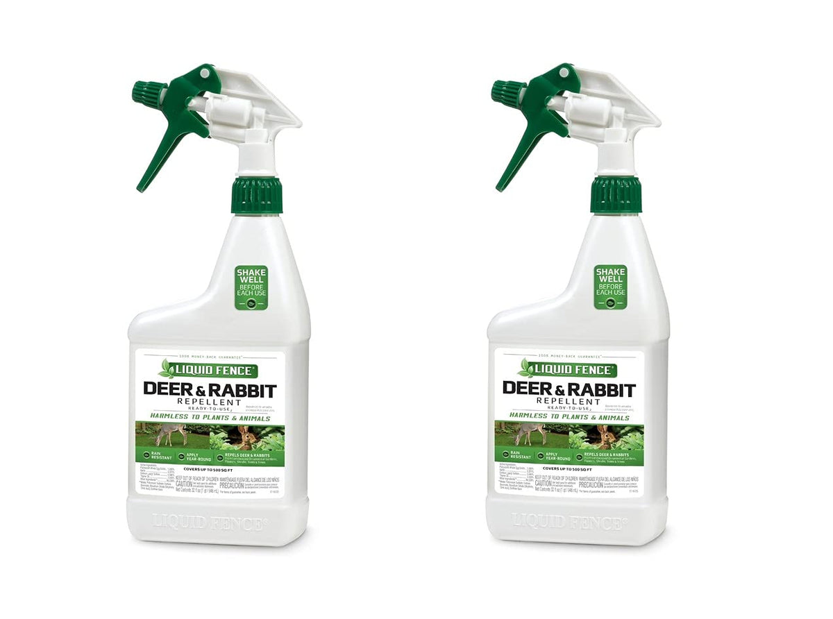 Liquid Fence bottle spray in use deters deer and rabbits from planting beds.