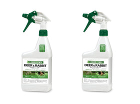 Liquid Fence bottle spray in use deters deer and rabbits from planting beds.