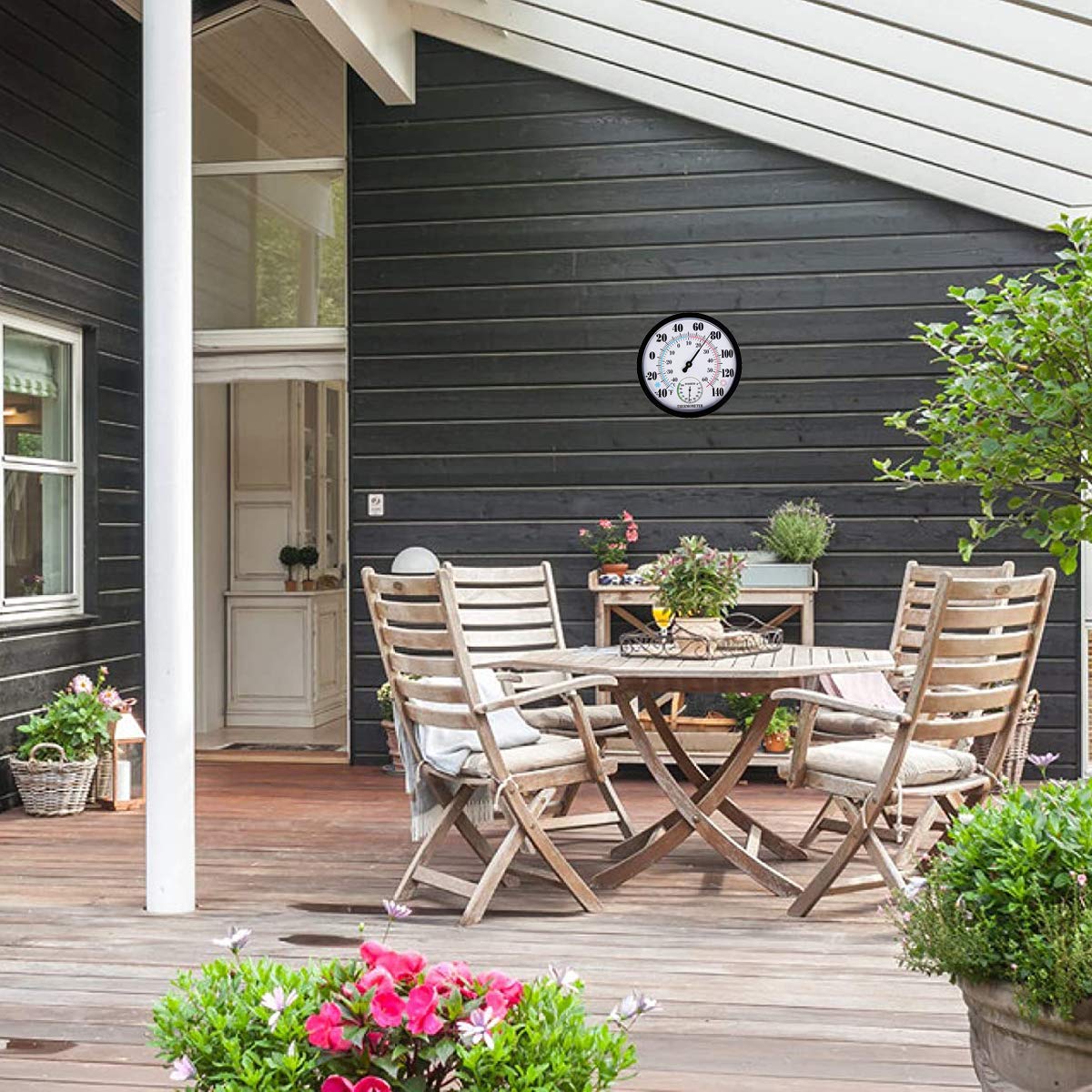 Lirches color accented thermometer hygrometer blends with patio plants and furniture