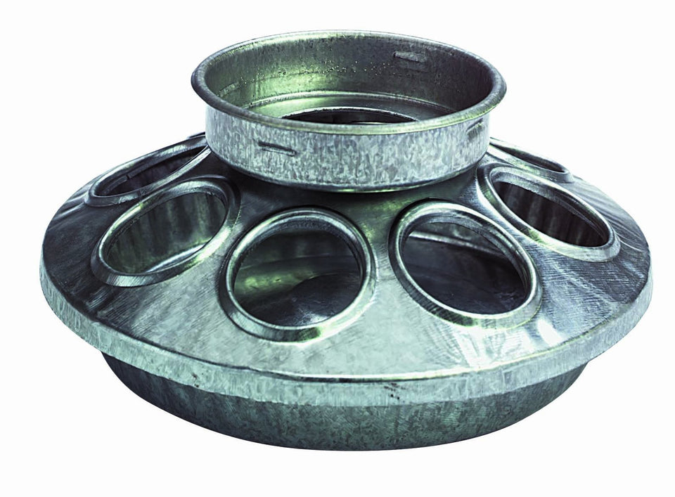 Little Giant feeder base in galvanized metal for gravity feeding chicks.